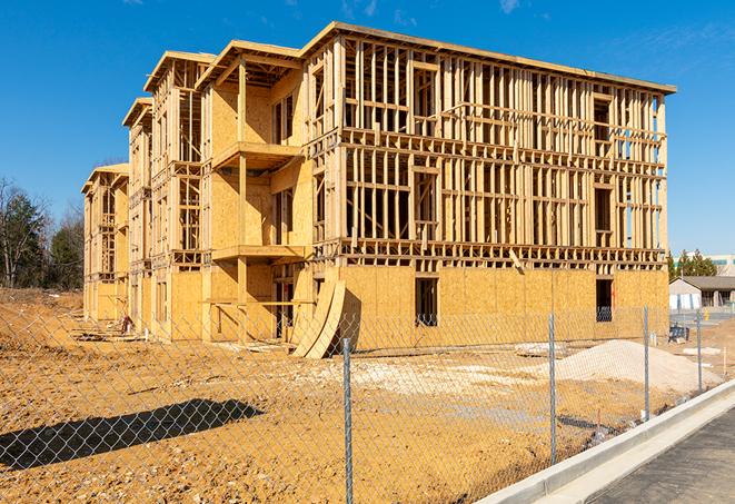 a snapshot of temporary chain link fences protecting a large construction project from unauthorized access in Fresno TX